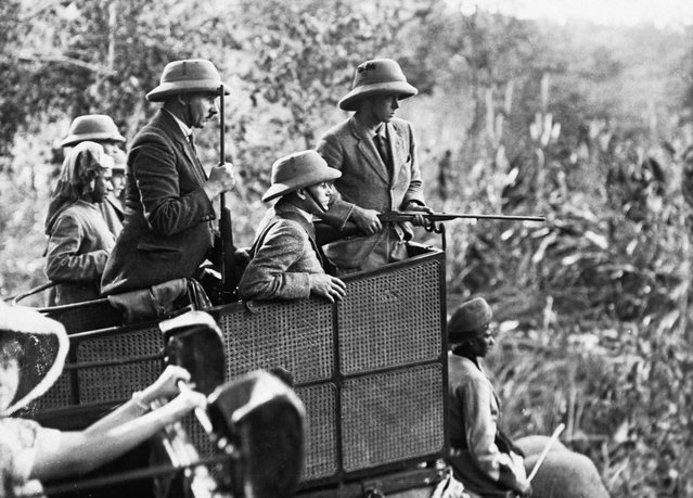 Edward, Prince of Wales, is accompanied by a group of other hunters as he goes tiger shooting in Nepal. 1921. (Photo by Hulton-Deutsch Collection/Corbis via Getty Images)