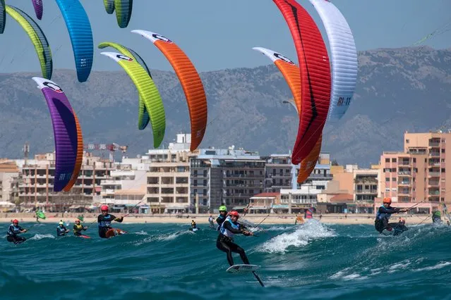 Competitors in action during the Formula Kite Men's class race on the fourth day of the 51st Princess Sofia Trophy sailing regatta off Palma de Mallorca, Balearic Islands, Spain, 07 April 2022. (Photo by Atienza/EPA/EFE)