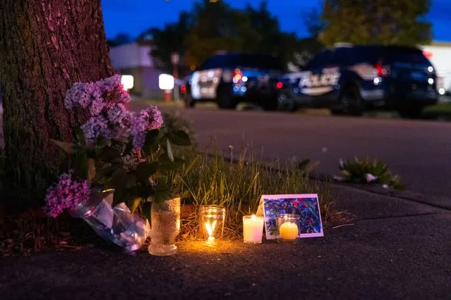 A small vigil set up across the street from a Tops grocery store on Jefferson Avenue in Buffalo, where a heavily armed 18-year-old White man entered the store in a predominantly Black neighborhood and shot 13 people, killing ten, Saturday, May 14, 2022. (Matt Burkhartt/The Washington Post)