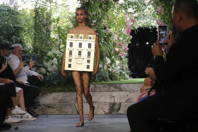 A model wears a creation for the Dior Haute Couture Fall-Winter 2020 fashion collection presented in Paris, Monday, July 1 2019. (Photo by Michel Euler/AP Photo)