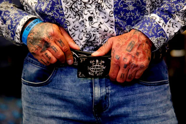 A models poses wearing a belt by “El Chapo 701”, a line in clothing, jewelry and liquor bearing the nickname of the jailed Mexican drug lord Joaquin “El Chapo” Guzman Loera, during the 72 edition of IM Intermoda Mexico fashion fair in Guadalajara, Mexico, on January 14, 2020. (Photo by Ulises Ruiz/AFP Photo)