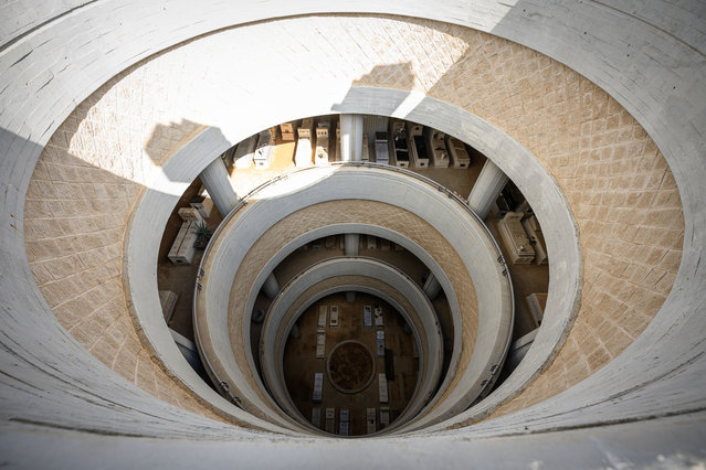 A central open-air architectural detail is seen in the interior of one of a number of multi-storey cemetery buildings on October 08, 2024 at Yarkon Cemetery in Tel Aviv, Israel. Tel Aviv is among the world's cities that have turned to multi-story cemeteries to cope with a shortage of burial space. England is also in the process of reviewing its burial and cremation laws in light of similar shortages in urban areas. The UK's Law Commission, which reviews legislation in England and Wales, is considering proposals to amend rules on grave re-use, saying that current burial and cremation laws are out of date and “unsuitable for the modern world”. (Photo by Leon Neal/Getty Images)