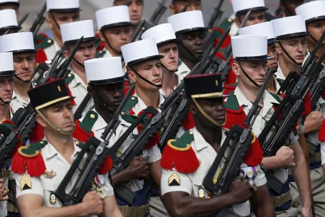 Troops of the French Foreign Legion attend the Bastille Day military parade on the Champs Elysees in Paris, France, July 14, 2016. (Photo by Benoit Tessier/Reuters)