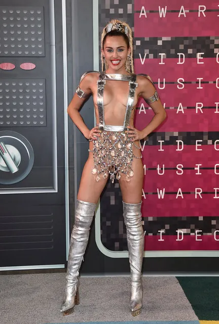 Miley Cyrus arrives at the MTV Video Music Awards at the Microsoft Theater on Sunday, August 30, 2015, in Los Angeles. (Photo by Jordan Strauss/Invision/AP Photo)