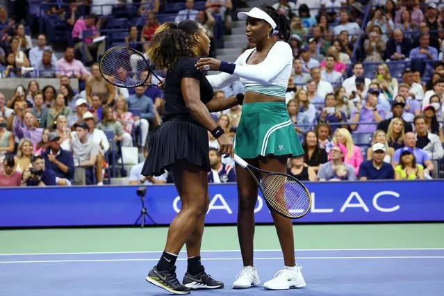 Serena Williams and Venus Williams of the United States on Arthur Ashe Stadium during their Women's Doubles match against Lucie Hradecka and Linda Noskova of the Czech Republic during the US Open Tennis Championship 2022 at the USTA National Tennis Centre on September 1st 2022 in Flushing, Queens, New York City. (Photo by Mike Segar/Reuters)