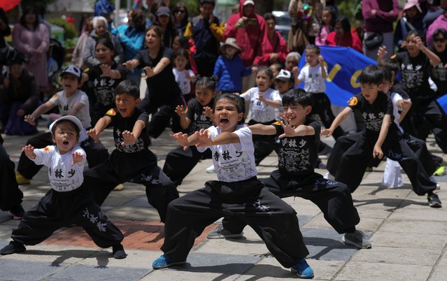 Youths perform martial arts during during a Chinese Lunar New Year celebration in La Paz, Bolivia, Sunday, January 26, 2025. (Photo by Juan Karita/AP Photo)