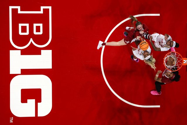 Alabama’s Karly Weathers, left, shoots over two Maryland players during their NCAA Tournament game on Monday, March 24, 2025. Maryland won 111-108 in double overtime to advance to the tournament’s Sweet Sixteen. (Photo by Patrick Smith/Getty Images)