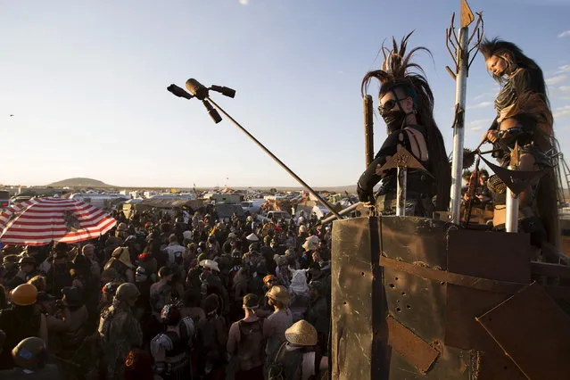 Guards watch over the crowd during the Wasteland Weekend event in California City, California September 26, 2015. (Photo by Mario Anzuoni/Reuters)