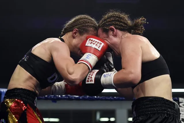 Belgium's Delfine Persoon (L) fights against Australia's Diana Prazak during the women's lightweight World Cup final boxing match of the WBC Mediterranean Championship in Wingene in the discrict of Zwevezele on November 11, 2014. (Photo by John Thys/AFP Photo)