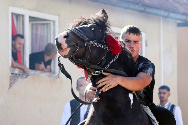 A Bosnian Muslim man rides a horse at the annual pilgrimage Ajvatovica during which they pray for rain and commemorate the legend of Ajvaz-Dedo, a 15th-century Islamic scholar, in Prusac, Bosnia and Herzegovina on June 29, 2025. (Photo by Amel Emric/Reuters)