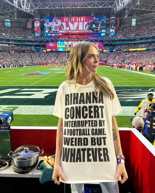 English model and actress Cara Delevingne lifts her shirt to reveal a tribute to Rihanna on the sidelines of Super Bowl LVII at State Farm Stadium in Glendale, Arizona on Sunday, February 12, 2023. (Photo by caradelevigne/Instagram)
