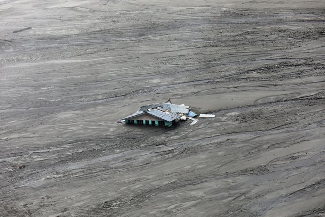 A mud-covered house after the cloudburst at Dharali village in Uttarkashi district, Uttarakhand state, northern India, 11 August 2025. Uttarakhand State Disaster Management Authority confirmed that over 1000 people have been rescued since a powerful cloudburst struck the Dharali area in the Uttarkashi district on 05 August, triggering flash floods that swept away a village and left several people dead. (Photo by Rajat Gupta/EPA)