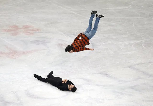 Canada's Keegan Messing backflips over Canada's Maxime Deschamps after the Gala Exhibition at the ISU World Figure Skating Championships 2023 in Saitama , Japan on March 26, 2023. (Photo by Issei Kato/Reuters)