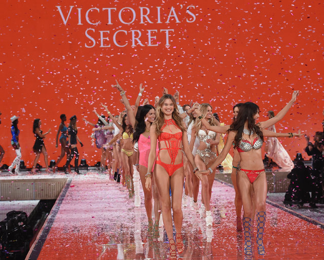 Models including Victoria's Secret Angel Adriana Lima, Victoria's Secret Angel Behati Prinsloo, Victoria's Secret Angel Lily Aldridge, walk the runway during the 2015 Victoria's Secret Fashion Show at Lexington Avenue Armory on November 10, 2015 in New York City. (Photo by Dimitrios Kambouris/Getty Images for Victoria's Secret)