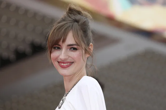 Actress Louise Bourgoin poses for photographers upon arrival at the premiere of the film “Yomeddine” at the 71st international film festival, Cannes, southern France, Wednesday, May 9, 2018. (Photo by Vianney Le Caer/Invision/AP Photo)