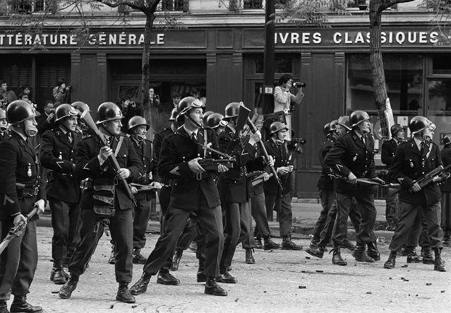 Armed riot police prepare for confrontation with  student protesters, Boulevard Saint Germain , Paris, France, May 6, 1968. (Photo by Gökşin Sipahioğlu/SIPA Press)