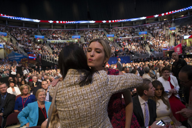 In this August 6, 2015 file photo, Ivanka Trump, daughter of Republican presidential candidate Donald Trump, center right, greets South Carolina Gov. Nikki Haley, center left, during the first Republican presidential debate at the Quicken Loans Arena in Cleveland. Ivanka Trump plays down her influence in her father's Republican presidential campaign, but the 33-year-old is a trusted and influential political adviser. (Photo by John Minchillo/AP Photo)