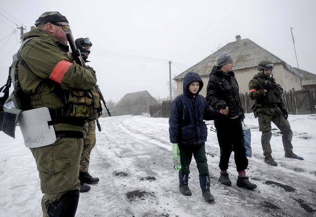 Ukrainian servicemen patrol Orekhovo village in Luhansk region January 28, 2015. (Photo by Maksim Levin/Reuters)
