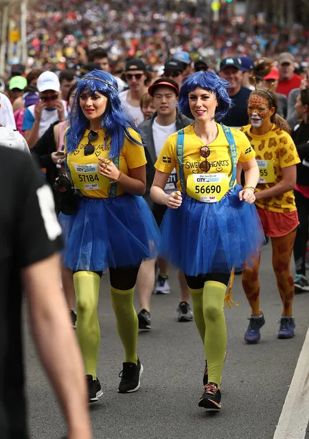 Competitors run up William Street during the start of the 2018 City to Surf on August 12, 2018 in Sydney, Australia. The City to Surf is an annual running event held in Sydney which sees participants run 14 kilometres from near Sydney's CBD to Bondi Beach. (Photo by Ryan Pierse/Getty Images)