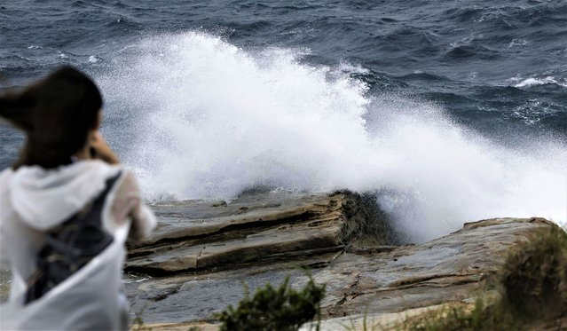 Waves hit the shore in Shirahama, Wakayama prefecture, western Japan Monday, August 14, 2023. A storm that used to be a typhoon has made a landfall at Japan's central region Tuesday and hitting large areas of western Japan with heavy rain and high winds. (Photo by Kyodo News via AP Photo)
