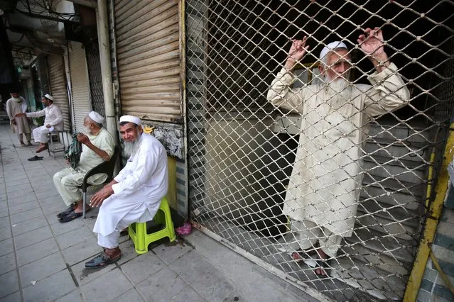 Closed shops following a crackdown on illegal forex trade and smuggling of US dollars in Peshawar, Pakistan, 08 September 2023. The Federal Investigation Agency (FIA) raided multiple shops in Chowk Yadgar, the province's largest currency market. In the Peshawar zone alone, 27 operations were carried out against Hundi references in the previous 20 days, resulting in the arrest of 28 people and the recovery of over 102 million Rupees. (Photo by Arshad Arbab/EPA/EFE)