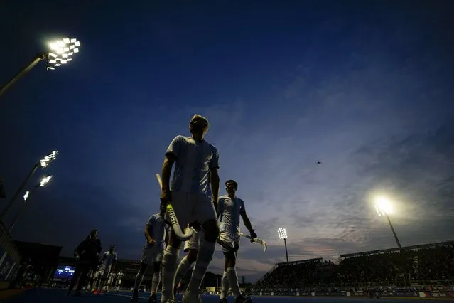 Argentina's players head to the locker room at half time during a men's team field hockey match against Chile at the Pan American Games in Santiago, Chile, Friday, October 27, 2023. (Photo by Matias Delacroix/AP Photo)
