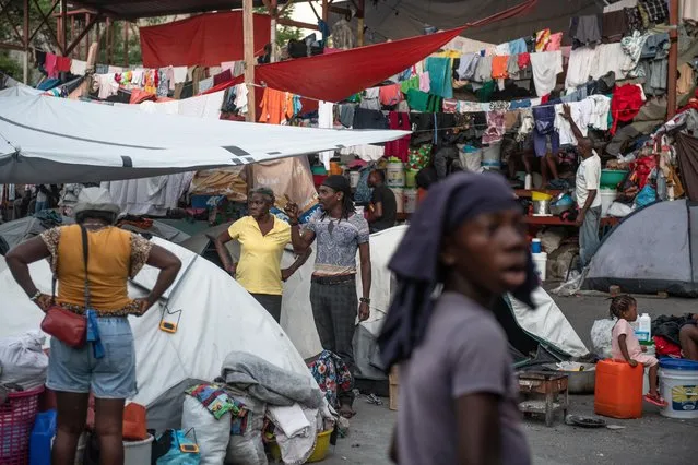 People displaced by gang violence stay in a temporary shelter, in Port-au-Prince, Haiti, 24 December 2023 (issued 25 December 2023). Street violence from criminal gangs in Haiti has caused the death of 3,960 people this year and the injury of more than 100,000, according to the latest figures provided by the United Nations. (Photo by Johnson Sabin/EPA)