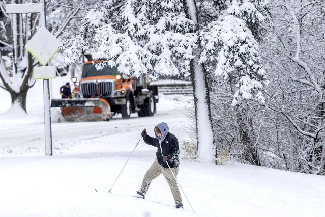 Eli Foxley uses cross-country skis at Elmwood Park in Omaha, Neb.,  on Tuesday, January 9, 2024. (Photo by Chris Machian/Omaha World-Herald via AP Photo)