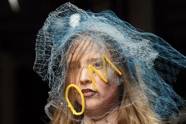 A model wears a creation for Vivienne Westwood's Fall-winter 2016-2017 ready to wear collection presented in Paris, France, Saturday, March 5, 2016. (Photo by Francois Mori/AP Photo)