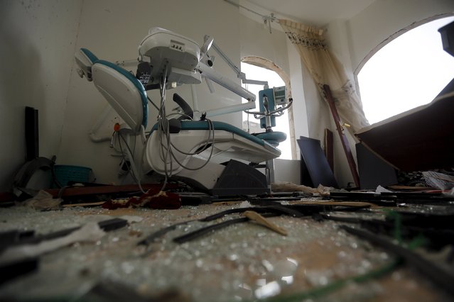 A dental clinic damaged in an air strike is seen in Sanaa April 26, 2015. (Photo by Khaled Abdullah/Reuters)