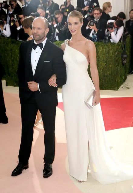 Rosie Huntington-Whiteley (R) and Jason Statham (L) arrives on the red carpet for the 2016 Costume Institute Benefit at The Metropolitan Museum of Art celebrating the opening of the exhibit 'Manus x Machina: Fashion in an Age of Technology' in New York, New York, USA, 02 May 2016. (Photo by Justin Lane/EPA)