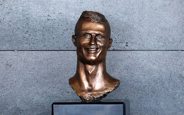 A bust of Cristiano Ronaldo is seen before the ceremony to rename Funchal Airport as Cristiano Ronaldo Airport in Funchal, Portugal March 29, 2017. (Photo by Rafael Marchante/Reuters)