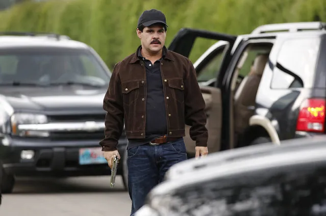 In this March, 21, 2017 photo, Mexican actor Marco de la O plays drug trafficker Joaquin Guzman during the filming of “El Chapo” in Tabio, Colombia. The life of the Mexican drug kingpin is being brought to television screens in a drama co-produced by Netflix and Univision. (Photo by Fernando Vergara/AP Photo)