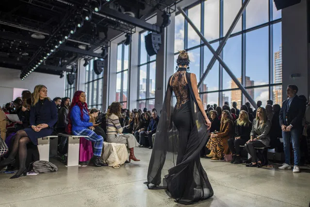 The Badgley Mischka collection is modeled at Spring Studios during NYFW Fall/Winter 2020 on Saturday, February 8, 2020, in New York. (Photo by Charles Sykes/Invision/AP Photo)