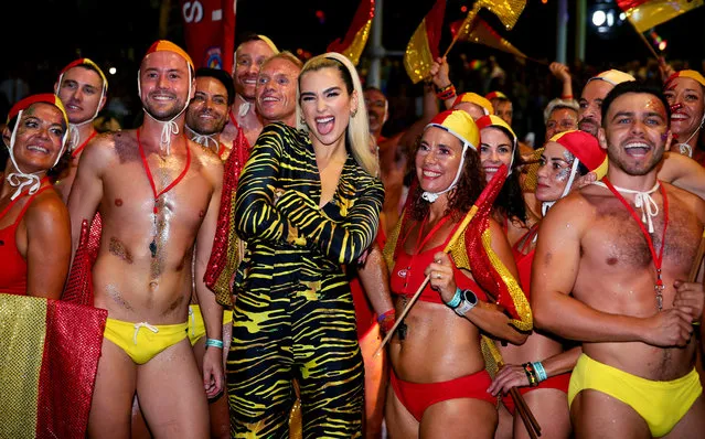 Dua Lipa poses amongst life guards during the 2020 Sydney Gay & Lesbian Mardi Gras Parade on February 29, 2020 in Sydney, Australia. The Sydney Mardi Gras parade began in 1978 as a march and commemoration of the 1969 Stonewall Riots of New York. It is an annual event promoting awareness of gay, lesbian, bisexual and transgender issues and themes. (Photo by Don Arnold/WireImage)
