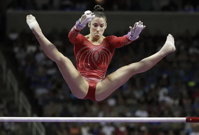 Aly Raisman competes on the uneven bars during the women's U.S. Olympic gymnastics trials in San Jose, Calif., Sunday, July 10, 2016. (Photo by Gregory Bull/AP Photo)