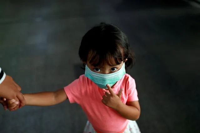 A girl wears a mask as a preventive measure against the coronavirus outbreak, in Bangkok, Thailand, February 7, 2020. (Photo by Soe Zeya Tun/Reuters)