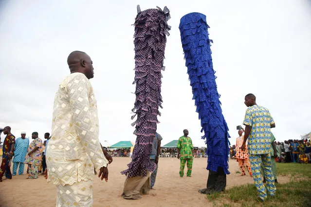 Masquerades, locally known as “Igunnuko”, are performed at the annual Badagry cultural festival near the old slave port in Badagry, on the outskirts of Lagos, Nigeria August 27, 2016. (Photo by Akintunde Akinleye/Reuters)