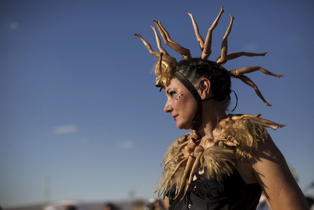 Enthusiast Barbara Ellquist, dressed as "Auntie Virus," poses for a portrait during Wasteland Weekend event in California City, California September 26, 2015. (Photo by Mario Anzuoni/Reuters)