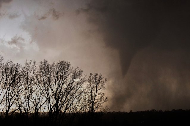 A tornados is seen just north of Omaha, Neb. from Highway 75 , on Thursday, April 17, 2025. (Photo by Chris Machian/Omaha World-Herald via AP Photo)