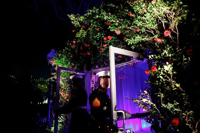 Marines open the tent doors for guests departing the State Dinner hosted by the Bidens for the Macrons, on the South Lawn of the White House, in Washington, U.S., December 1, 2022. (Photo by Evelyn Hockstein/Reuters)