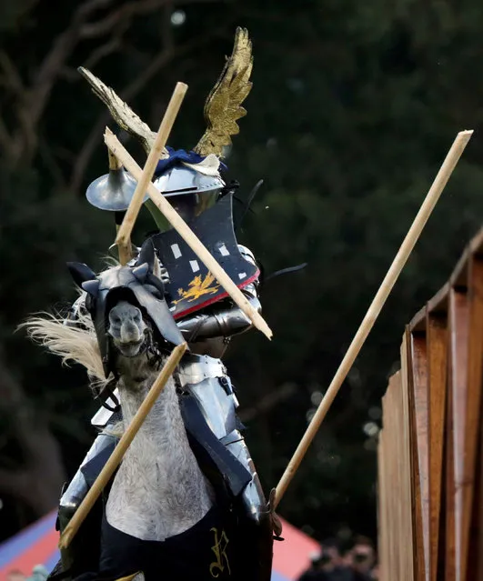 Jousting knight Arne Koets from the Netherlands (L) scores by breaking his lance on an opponent but was also struck during the final round of the jousting competition the St Ives Medieval Fair in Sydney, one of the largest of its kind in Australia, September 25, 2016. (Photo by Jason Reed/Reuters)