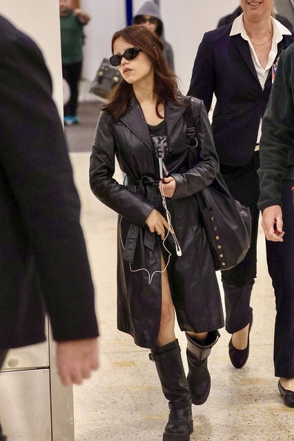 Jenna Ortega, Tim Burton, and co-star Emma Myers arrived in Sydney on a Wednesday, August 13, 2025, embracing their Wednesday theme in matching black outfits. The gothic trio is in Australia to enchant fans ahead of the highly anticipated Season 2 of Netflix's hit Addams Family reboot. Pictured: American actress Jenna Ortega. (Photo by Media-Mode/Splash News and Pictures)