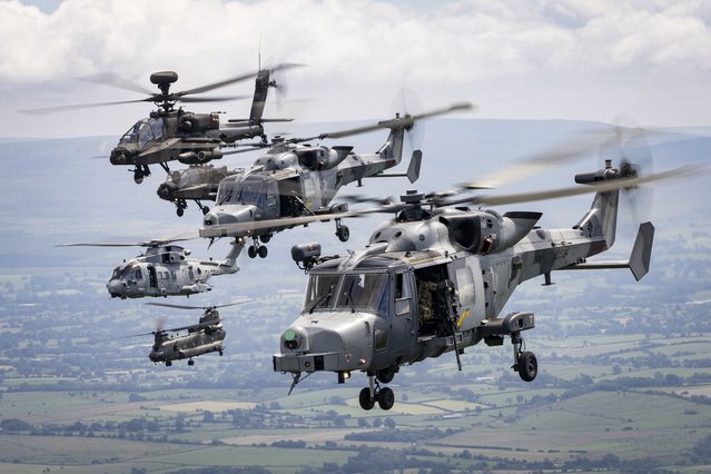 RAF aircraft fly over North Yorkshire, UK on July 25, 2025 as part of Exercise Hades Warrior, an intensive assessment for pilots to become qualified weapons and helicopter tactics instructors. (Photo by Josh Gorman RAF/MOD)
