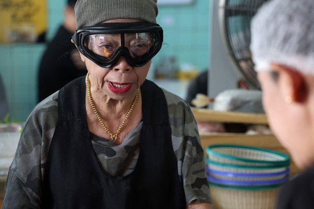 Michelin star chef Jay Fai, a longtime icon of Thai street food culture, looks on at her restaurant in Bangkok on November 22, 2025. (Photo by Sebastien Berger/AFP Photo)