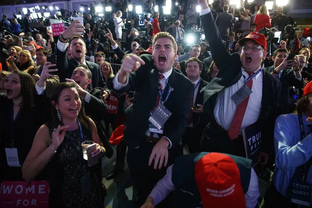 Supporters of Republican presidential candidate Donald Trump cheer as they watch election returns during an election night rally, Tuesday, November 8, 2016, in New York. (Photo by Evan Vucci/AP Photo)