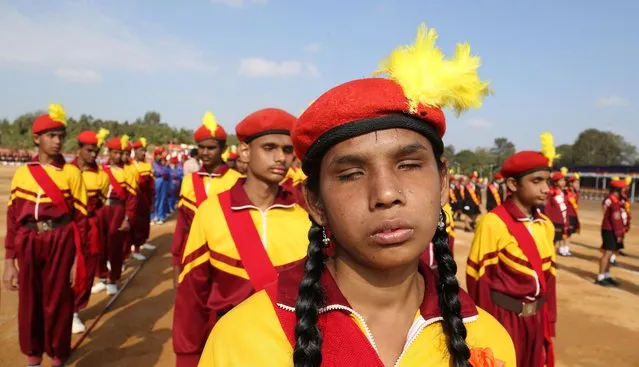 Visually impaired students wait to take part in full dress rehearsals of the Republic Day parade in Bangalore, India, Saturday, January 24, 2015. (Photo by Aijaz Rahi/AP Photo)