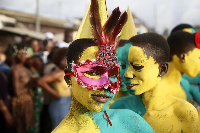 Ivorians take part in a parade on the last day of the 42th Popo Carnival in Bonoua, 60km south of Abidjan, Ivory Coast, 30 April 2021. The carnival of Bonoua is the Ivorians version of Mardi Gras running for a week. Derived from a celebration of the cultural heritage of the Aboure people, the Popo Carnival involves gastronomic competitions, Miss pageants, sports days, a festival of traditional dances and reflection workshops on Popo museum amongst other activities. (Photo by Legnan Koula/EPA/EFE)
