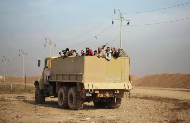 A military vehicle of the Iraqi army is pictured during an operation against Islamic State militants in the frontline neighbourhood of Intisar, eastern Mosul November 27, 2016. (Photo by Mohammed Salem/Reuters)