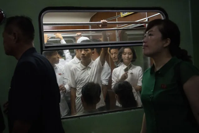 North Koreans travel on the Pyongyang metro on August 21, 2018 in Pyongyang, North Korea. (Photo by Carl Court/Getty Images)